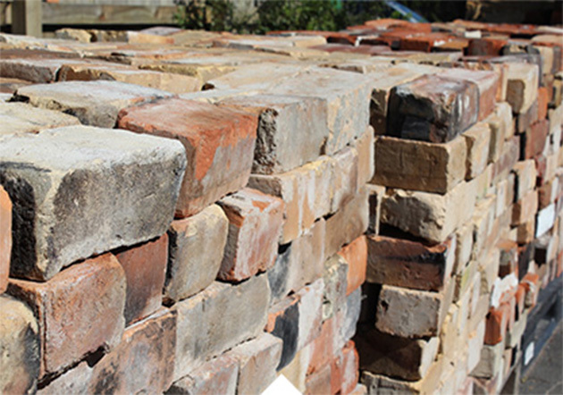 Stacks of recycled bricks at Burrell Salvage